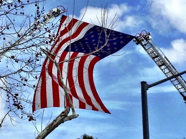 Flag hanging from Santa Cruz and San Jose fire...