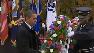 Obama honors veterans at Arlington cemetery