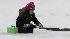 Six year-old Emily Cerruti plays in the snow...