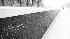 Snow blows over and sticks to the names of the...