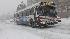 A Metrobus moves up the hill on 13th Street in...
