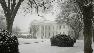 A powerful winter storm bore down on the Mid-Atlantic on Friday, and the federal government prepared to shut early.
