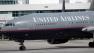In a file photo a United Airlines plane heads away from the gates of the B concourse at Denver International Airport Aug. 24, 2006.