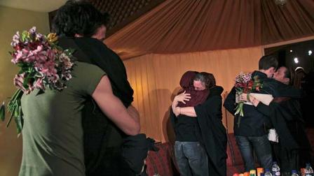 Cindy Hickey, mother of Shane Bauer, right, Nora Shourd, mother of Sarah Shourd, 3rd right, and Laura Fattal, second left, mother of Josh Fattal hug their children at the Esteghlal hotel in Tehran, Iran, Thursday, May 20, 2010.