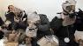 South Korean residents wear their gas masks at a shelter on Yeonpyeong island, South Korea.