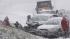 Winter snow storm bears down on Northeast :: A band of frigid weather was snaking up the East Coast, promising blizzards and a foot of snow for New York and New England.