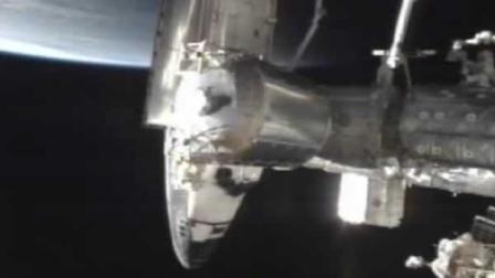 This frame grab from NASA-TV shows space shuttle Atlantis docked at the International Space Station, Sunday, July 10, 2011. Atlantis is delivering more than 4 tons of food, clothes and other space station provisions  an entire years worth, in fact, to keep the complex going in the looming post-shuttle era. Atlantis journey marks the final shuttle mission by NASA. (AP Photo/NASA)
