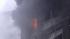 In this image taken from TV smoke and flames...