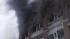 In this image taken from TV smoke and flames...