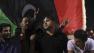 People demonstrate against Moammar Gadhafi at the Green Square in Tripoli, Libya, late Tuesday, Aug. 30, 2011.