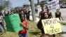 Michael M. Krop Senior High School students carry signs and chant during a rally demanding justice for Trayvon Martin, Friday, March 23, 2012, in Miami Gardens, Fla.