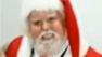 Thomas Tolbert says when he went to Disney World for a family trip, people asked for his autograph. He notes that hes used to being mistaken for Santa. Tolbert signed autographs until a Disney representative told him he needed to change clothes.