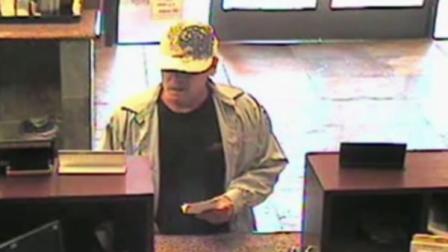 Serial bank robber turns himself into police.