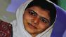 Supporter holds poster of 14-year-old schoolgirl Malala Yousufzai
