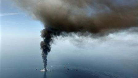FILE - In this April 21, 2010 file photo, the Deepwater Horizon oil rig burns in the Gulf of Mexico.
