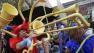 Revelers gather for the start of the Society of Saint Anne walking parade during Mardi Gras