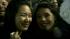 Two girls smiling after new pope was announced