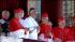 Pope Francis standing with cardinals