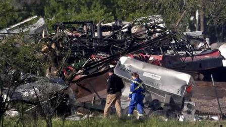 Emergency workers patrol the scene Saturday, April 20, 2013, three days after an explosion at a fertilizer plant in West, Texas.