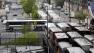 Shuttle buses line up to transport commuters at the transportation center in Bridgeport, Ct., Monday, May 20, 2013