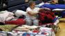 Sherri Kaderka looks in her bag at the American Red Cross shelter in Monument, Colorado