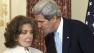 Secretary of State John Kerry whispers to his wife Teresa Heinz Kerry during the ceremonial swearing-in for him as the secretary of state.