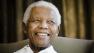 Former South African President Nelson Mandela reacts at the Mandela foundation, in Johannesburg, South Africa.