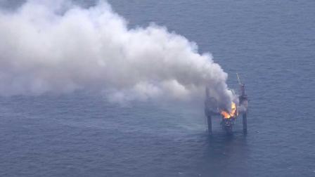 A fire is seen on the Hercules 265 drilling rig in the Gulf of Mexico off the coast of Louisiana, Wednesday, July 24, 2013.