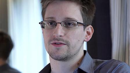 This photo provided by The Guardian Newspaper in London shows Edward Snowden, who worked as a contract employee at the National Security Agency, on Sunday, June 9, 2013