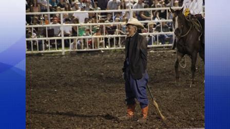 a clown wearing a mask intended to look like President Obama at the Missouri State Fair