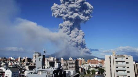 In this photo released by Kagoshima Local Meteorological Observatory, volcanic smoke billows from Mount Sakurajima in Kagoshima, on the southern Japanese main island of Kyushu Sunday, Aug. 18, 2013