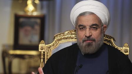In this Sept. 10, 2013 photo released by the official website of the office of the Iranian Presidency, Iranian President Hasan Rouhani speaks during an interview with state television at the presidency in Tehran, Iran