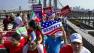 Participants in a march and rally walk across the Brooklyn Bridge during the event highlighting immigration reform Saturday, Oct. 5, 2013, in New York