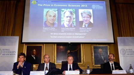 The Royal Swedish Academy of Sciences Torsten Persson, from left, Per Krusell, Staffan Normark and Per Stromberg announce the winners of 2013 Nobel Memorial Prize in Economic Sciences in Stockholm, Monday Oct. 14, 2013.