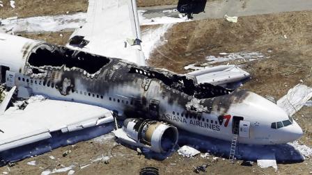 FILE - This July 6, 2013, file photo, shows the wreckage of the Asiana Flight 214 airplane after it crashed at the San Francisco International Airport in San Francisco