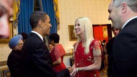 This photo released by the White House Nov. 27, 2009, shows President Barack Obama greeting Michaele and Tareq Salahi.