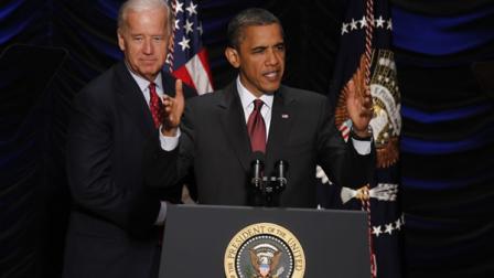 President Barack Obama speaks before he signs the Dodd-Frank Wall Street Reform and Consumer Protection financial reform bill at the Ronald Reagan at the Ronald Reagan Building in Washington, Wednesday, July 21, 2010. At left is Vice President Joe Biden. (AP Photo/Charles Dharapak)