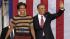 President Barack Obama, accompanied by first...