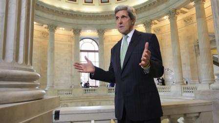 Supercommittee member Sen. John Kerry, D-Mass., talks during TV interview about the deficit reducing panels unfinished work Monday morning on Capitol Hill as their deadline approaches with little expectation for success, in Washington, Nov. 21, 2011.
