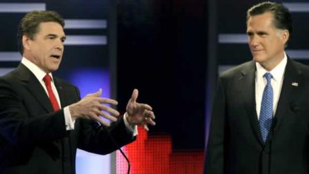 Republican presidential candidates Texas Gov. Rick Perry, left, and former Massachusetts Gov. Mitt Romney take part in the Republican debate, Saturday, Dec. 10, 2011, in Des Moines, Iowa. (AP Photo/Charlie Neibergall)