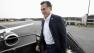 Republican presidential candidate, former Massachusetts Gov. Mitt Romney, boards his campaign charter plane in Bedford, Mass.