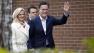 Republican presidential candidate, former Massachusetts Gov. Mitt Romney and his wife Ann arrive to host a pancake breakfast at Brookwood High School in Brookwood, Ga.