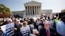 Protesters in favor of health care reform demonstrate outside of the Supreme Court in Washington, Monday, March 26, 2012, as a hearing on President Obamas health care legislation began. (AP Photo/Jacquelyn Martin)