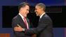 President Obama and Mitt Romney shake hands as they take the stage for the debate.