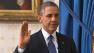 President Obama raising his hand, taking oath