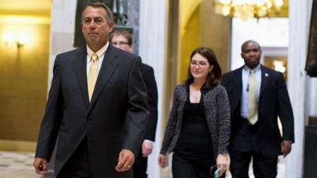 House Speaker John Boehner of Ohio walks to the House Chamber on Capitol Hill in Washington, Thursday, Oct. 3, 2013. President Barack Obama laid the blame for the governments partial shutdown at the feet of Boehner Thursday, escalating a confrontation that is running the risk of a potentially damaging clash over the nations borrowing authority. (AP Photo/ Evan Vucci)