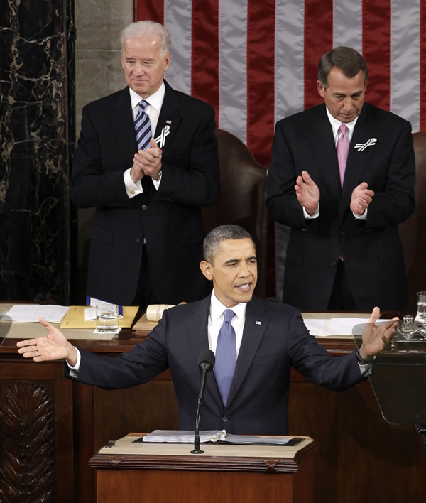 President Barack Obama gestures on Capitol Hill...
