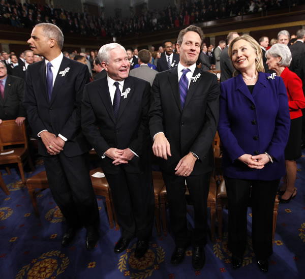 Members of President Barack Obama's Cabinet,...