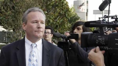 Michael Barrett, accused of secretly making nude videos of ESPN reporter Erin Andrews, leaves after his appearance in federal court in Los Angeles on Friday, Nov. 20, 2009. (AP Photo/Reed Saxon)