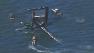 An Oracle Team USA boat with the Americas Cup racing event capsized in San Francisco Bay this afternoon.